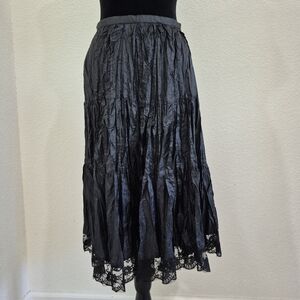 Chic Black A-Line Skirt with Lace Hem